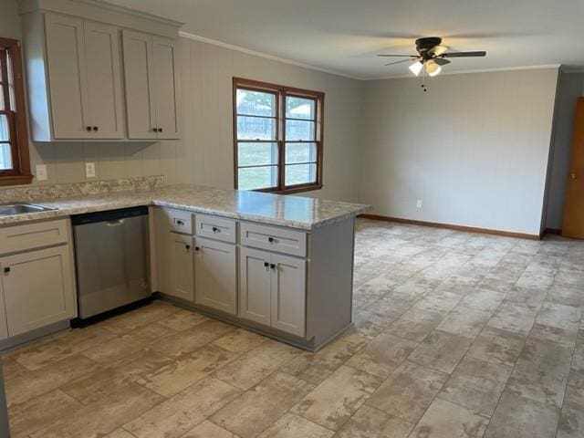 kitchen featuring dishwasher, a healthy amount of sunlight, crown molding, and kitchen peninsula