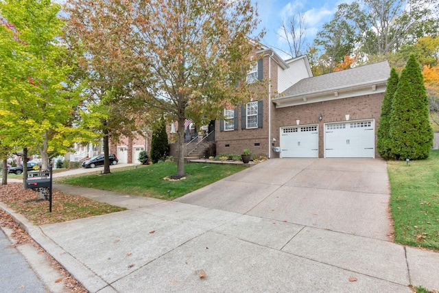 view of front facade featuring a garage and a front lawn