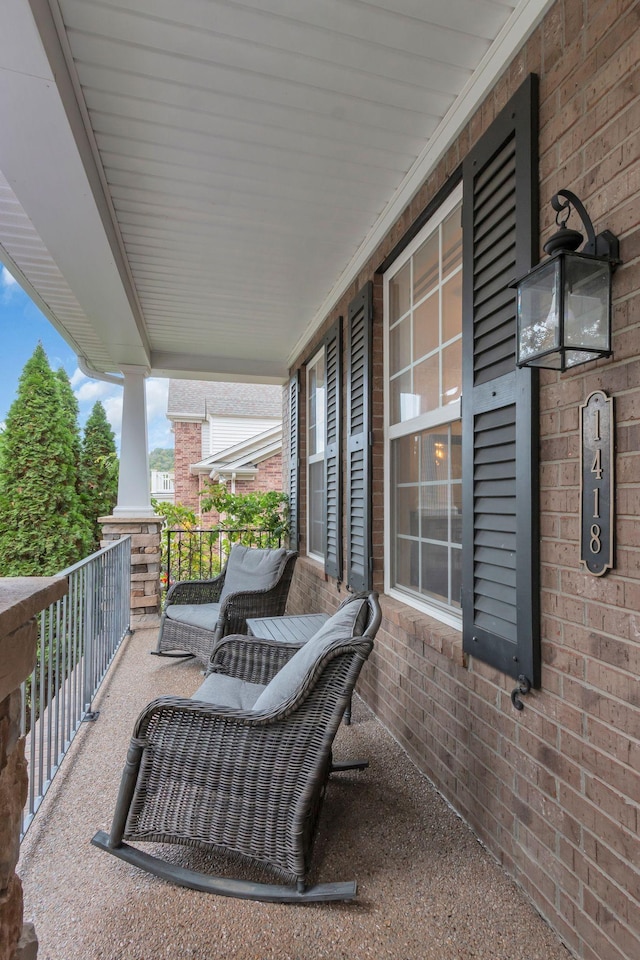 balcony featuring covered porch