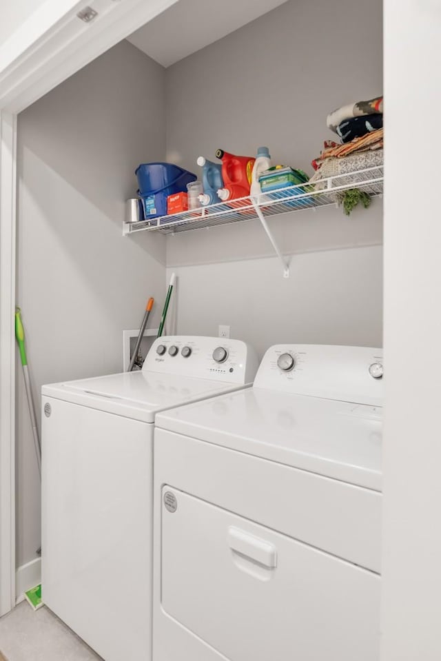 laundry area with washer and clothes dryer