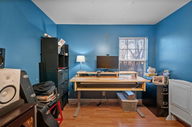 office area with light hardwood / wood-style flooring