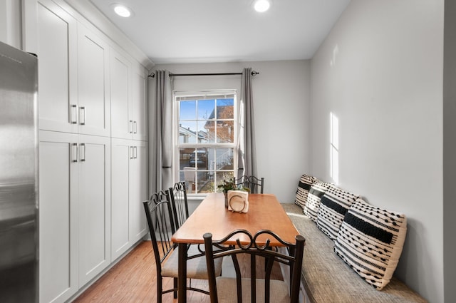 dining room with light hardwood / wood-style flooring