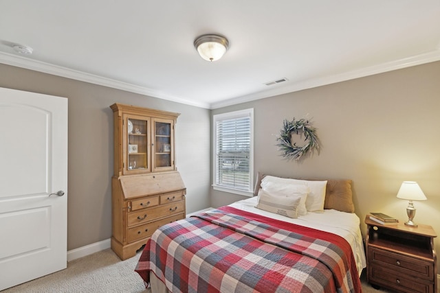 bedroom featuring crown molding and light colored carpet