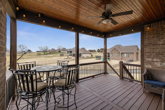 wooden terrace with ceiling fan