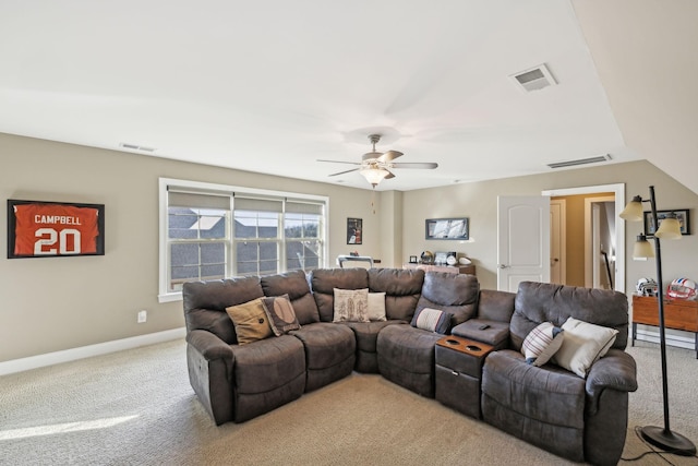 living room featuring light carpet and ceiling fan