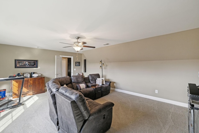 living room featuring light carpet, vaulted ceiling, and ceiling fan