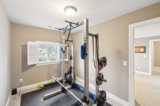 workout room featuring carpet flooring