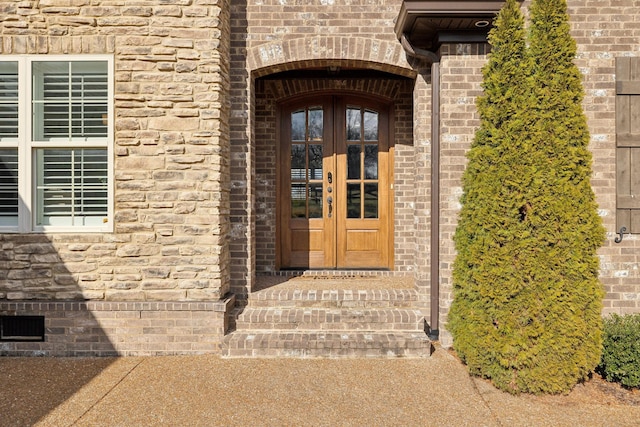 entrance to property with french doors