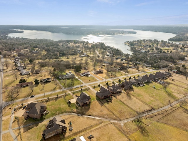 bird's eye view featuring a rural view and a water view