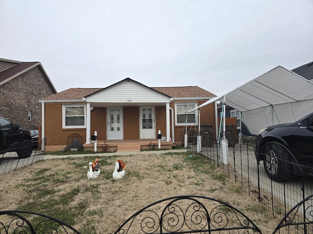 view of front of house featuring a carport