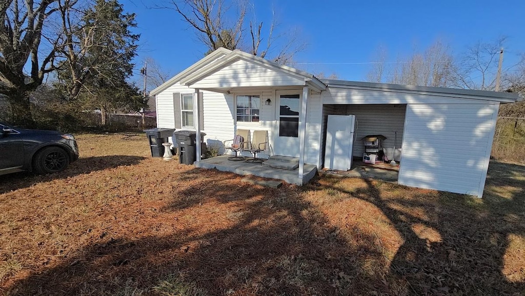 back of house featuring a patio