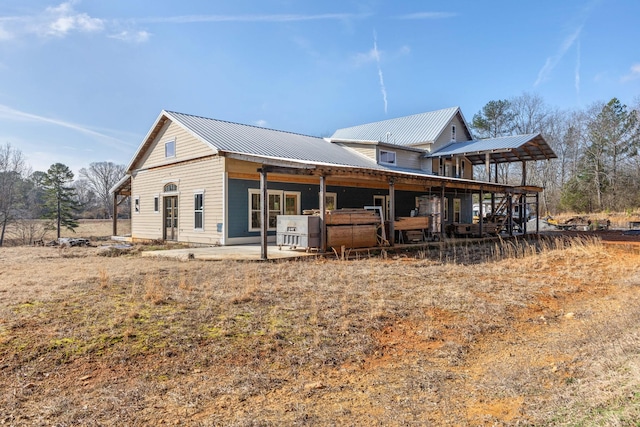 rear view of house featuring a patio area