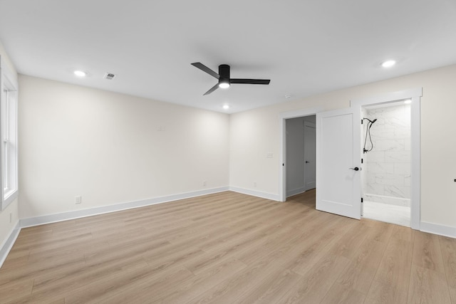 unfurnished room featuring ceiling fan and light hardwood / wood-style floors