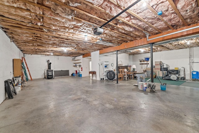 basement featuring a wood stove