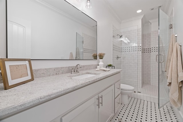 bathroom featuring vanity, ornamental molding, tile patterned floors, toilet, and walk in shower