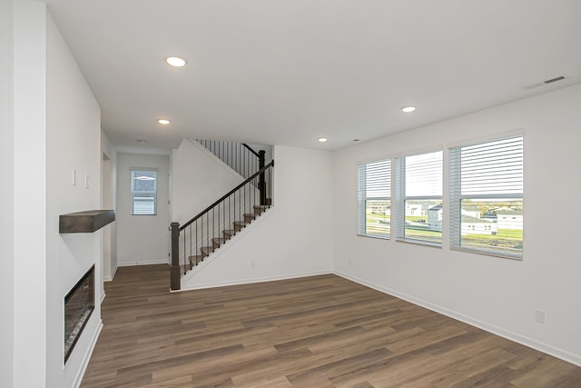 living room featuring dark hardwood / wood-style flooring