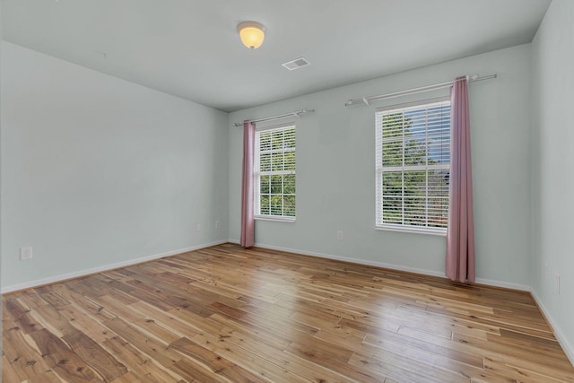 empty room with light wood-type flooring