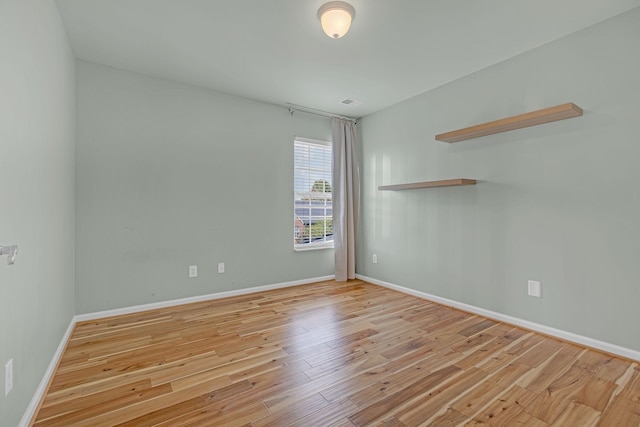 empty room featuring light hardwood / wood-style floors