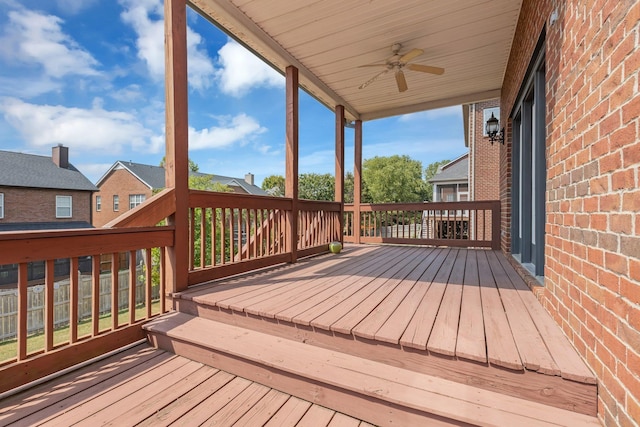 wooden deck with ceiling fan