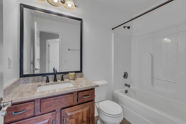 full bathroom with shower / bathing tub combination, vanity, and toilet