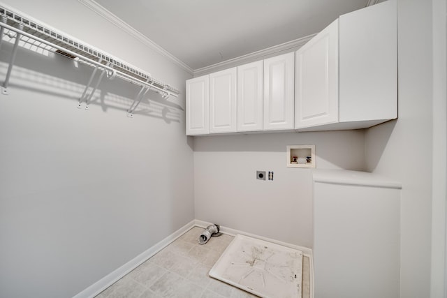 laundry room with crown molding, cabinets, hookup for a washing machine, and electric dryer hookup