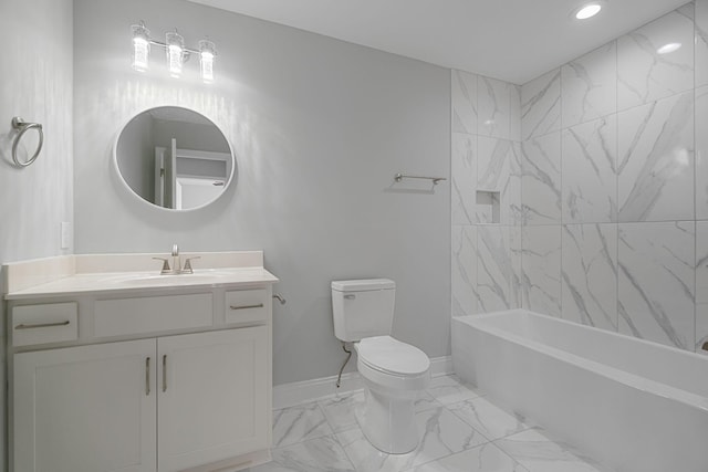 full bathroom with vanity, tiled shower / bath, and toilet