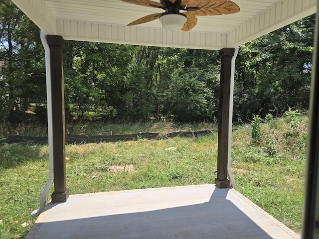 view of yard featuring ceiling fan