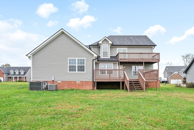 rear view of property featuring a lawn, a deck, and central air condition unit