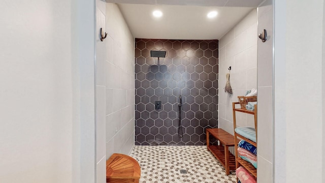 bathroom with tiled shower