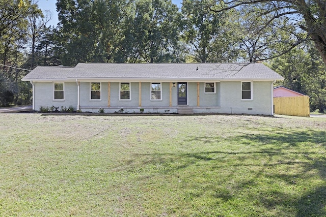 single story home featuring a front yard