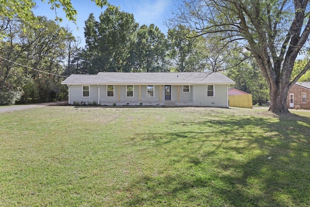 ranch-style house with a front lawn