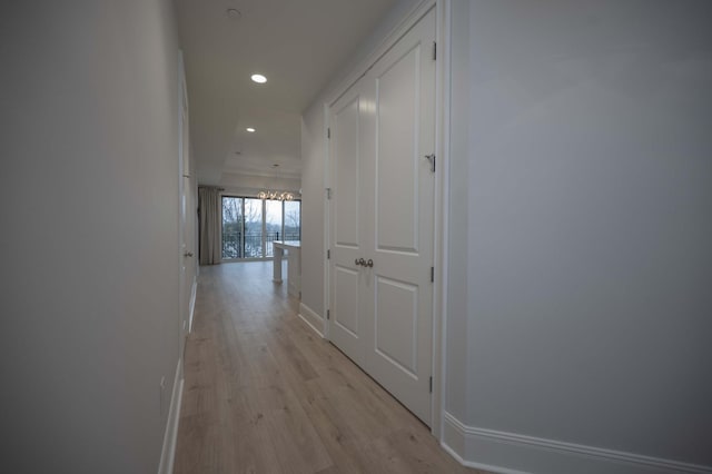 hallway with light wood-type flooring