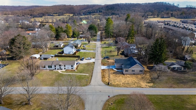 birds eye view of property with a residential view