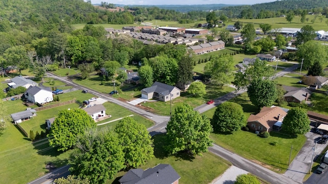 birds eye view of property with a residential view