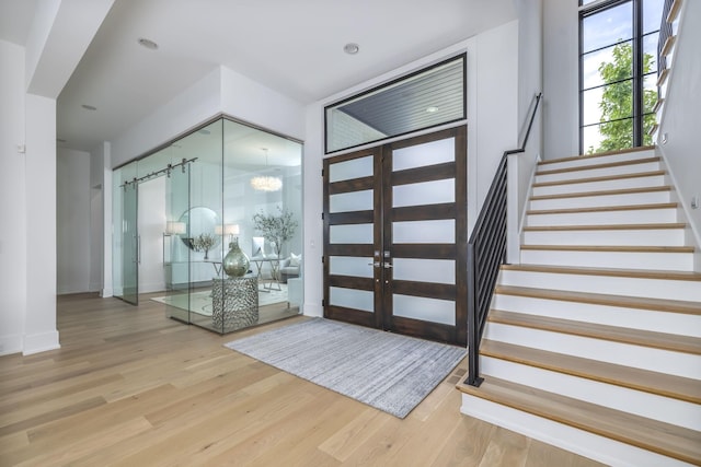 foyer with light wood-type flooring