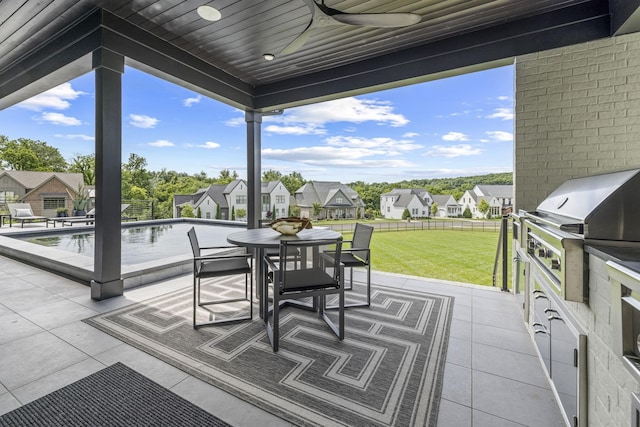 view of patio / terrace featuring an outdoor kitchen and area for grilling