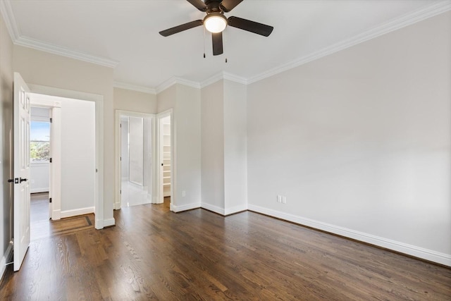 unfurnished room with crown molding, ceiling fan, and dark hardwood / wood-style flooring