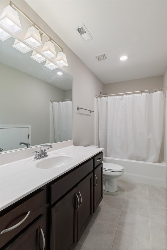 full bathroom with vanity, tile patterned floors, toilet, and shower / bathtub combination with curtain