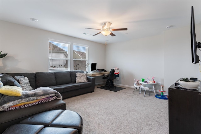 living room with carpet floors and ceiling fan