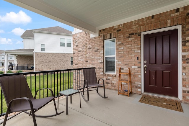 balcony featuring covered porch