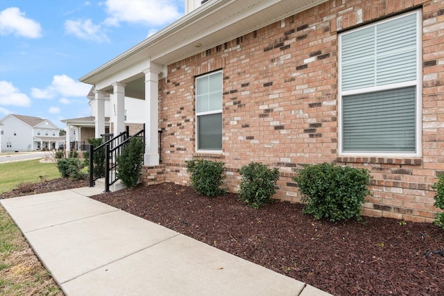 entrance to property featuring a porch