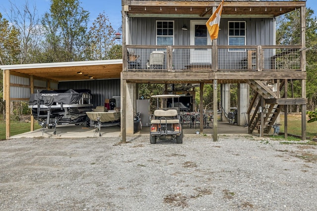 rear view of property featuring a deck