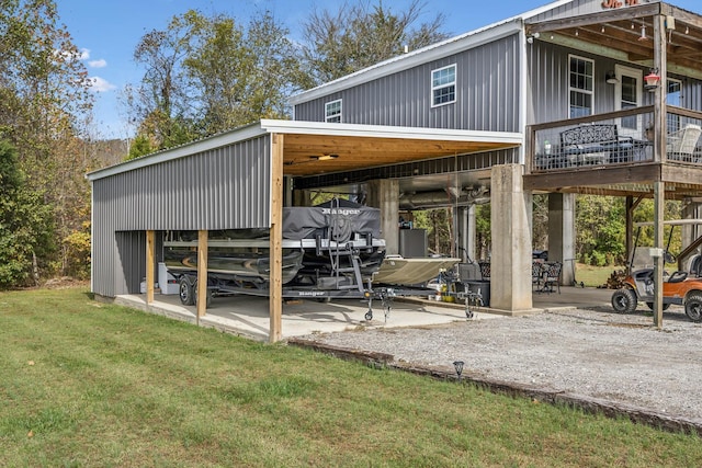 back of house featuring a yard