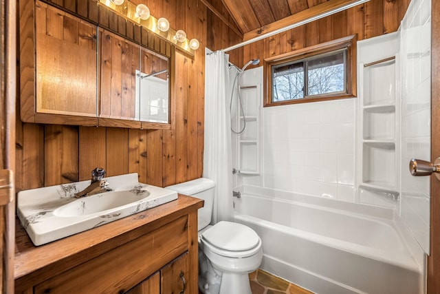 full bathroom featuring vanity, shower / bathtub combination with curtain, wooden walls, and toilet