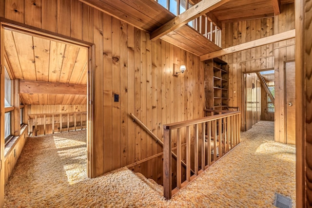 hall with wooden walls and wooden ceiling