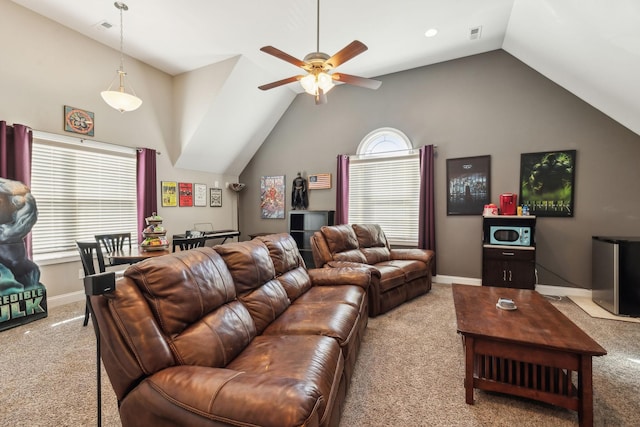 living room featuring lofted ceiling, light carpet, and ceiling fan