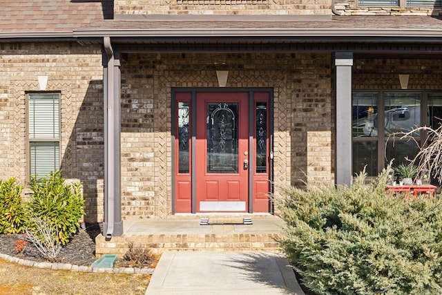 property entrance with covered porch