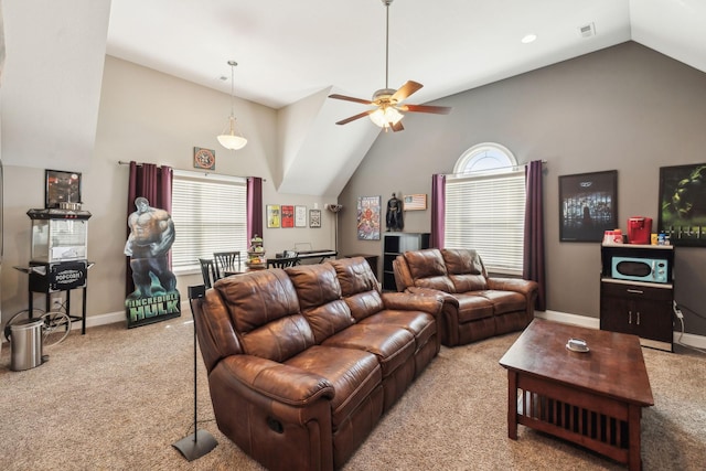 carpeted living room featuring lofted ceiling and ceiling fan