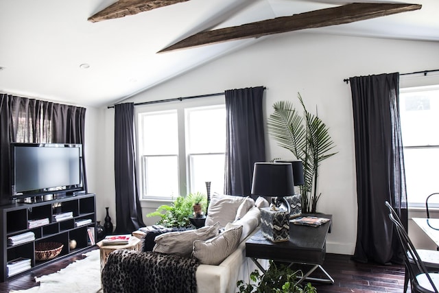 living room with dark wood-type flooring and lofted ceiling with beams