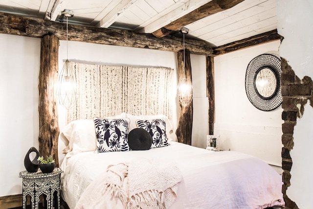 bedroom featuring beam ceiling and wooden ceiling